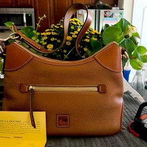 Dooney satchel like new dust bag included natural color